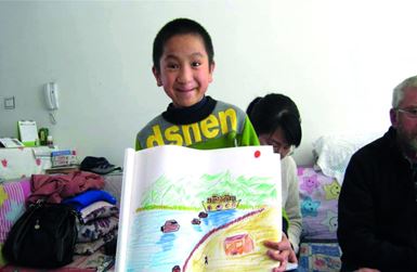 Xiao Long was born with a cleft palate and was abandoned by his birth parents. But through Care for Children’s support, he now has a new foster family who love and encourage him. Photo: Care for Children