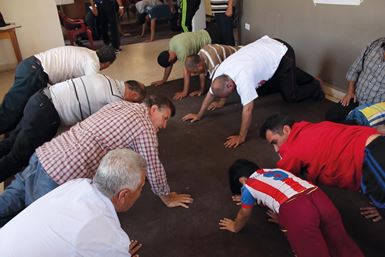 Exercise classes are helping refugee men feel more healthy and hopeful. Photo: Stella Chetham/Tearfund