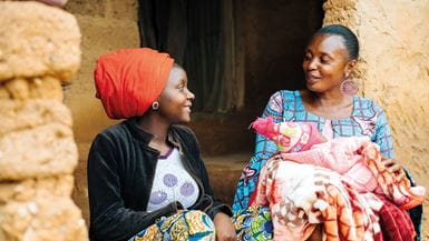 Sometimes new mothers suffer from low moods and depression. Support them practically and emotionally and encourage them to get plenty of rest. Photo: Tom Price/Tearfund