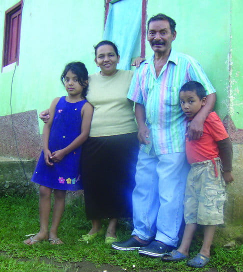Photo of family who benefit from project. Photo: Rommel Romero